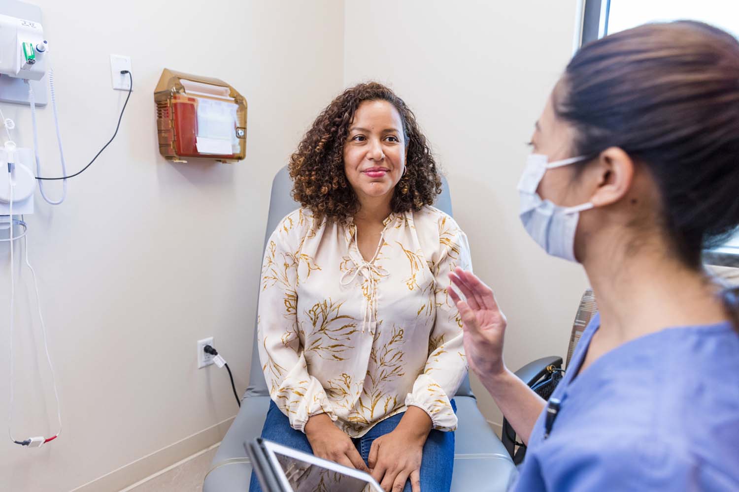A patient talking to a provider